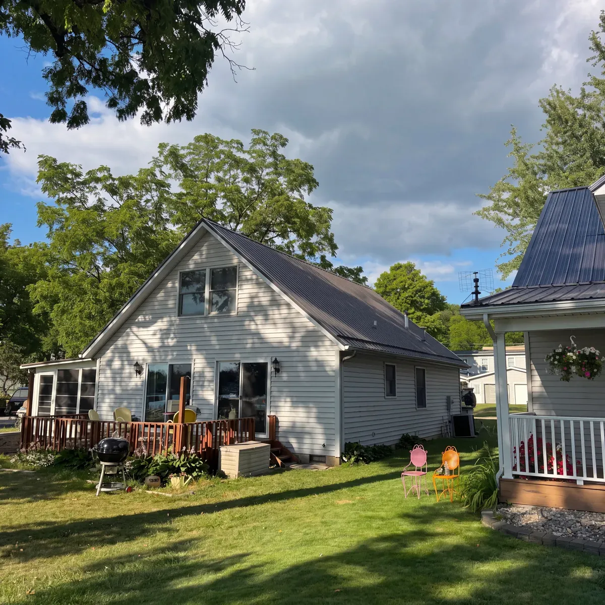 Standing seam metal roof installed on a cottage