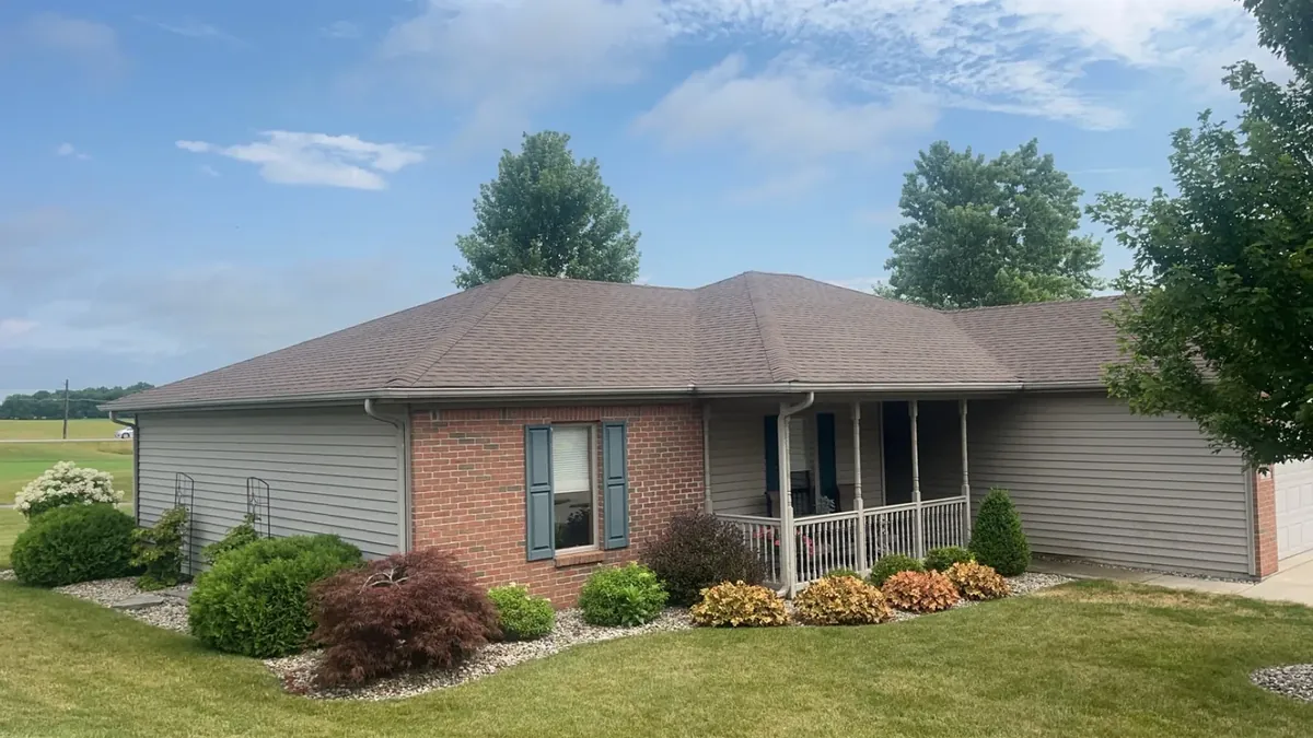 Brick ranch home with a new asphalt shingle roof in Northeast Indiana