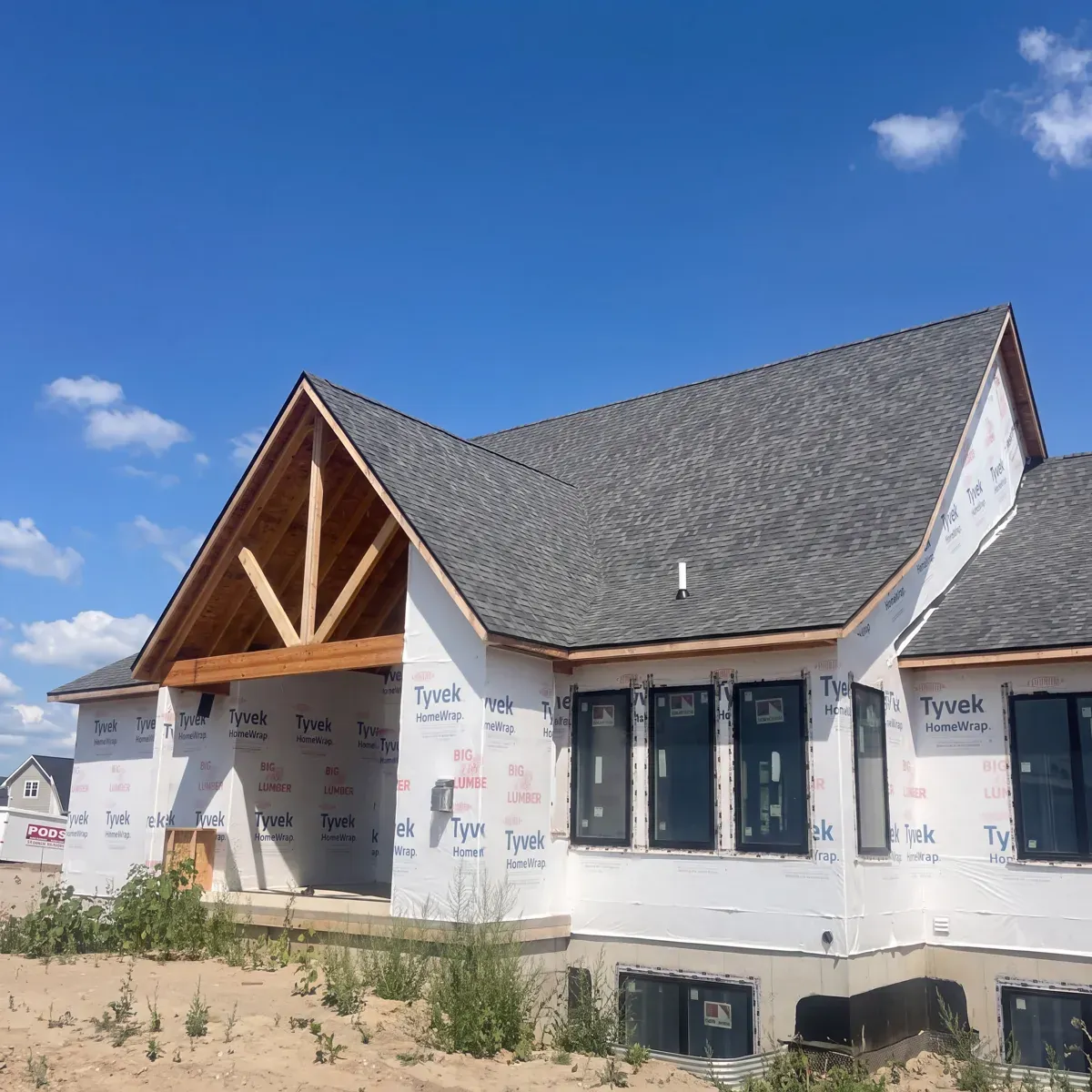 Roof deck covered in synthetic underlayment during a GNG roof replacement